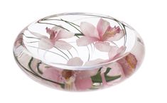 a glass vase with pink flowers in it