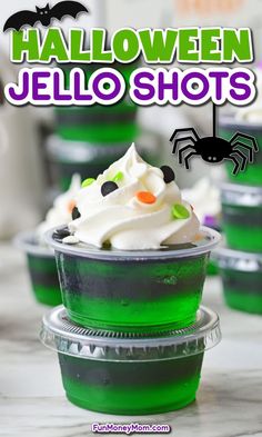 halloween jello shots in plastic cups with sprinkles and spider on top