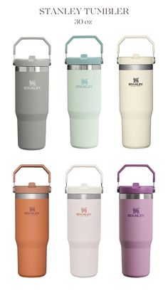 the stanley tumbler is shown in four different colors and features an insulated handle