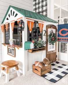 a football themed house with an orange and white flag