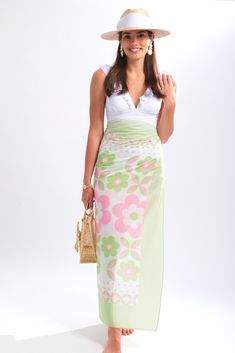 Introducing our classic pareo in a new print for pink and green lovers. Featuring a luxury cotton voile fabric. Perfect to wear as a coverup from the beach to lunch. Add your favorite sunhat to complete this timeless look. Green Printed Beachwear Sarong, Beachwear Block Print Sarong For Beach Cover-up, Beachwear Block Print Sarong As Beach Cover-up, Block Print Sarong For Beach Cover-up, Multicolor Block Print Sarong For Beach Cover-up, Cotton Voile Fabric, Resort Collection, Cotton Voile, New Print