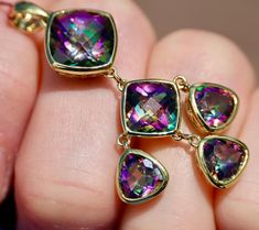 Metal: 14K 585 yellow gold Marks/Stamps: "AMI 14K"    Size: 1.8"/46 mm long  (including bail) X 0.86"/22mm wide  Weight: 6.67 grams  Mystic Topaz: checkerboard surface facets, beautiful rainbow glow  Condition: great vintage, Near Mint Luxury Gold Topaz Gemstones, Mystic Topaz, Beautiful Rainbow, Drop Pendant, Solid Yellow, Pendant Necklaces, Beautiful Jewelry, Topaz, Jewelry Necklace Pendant