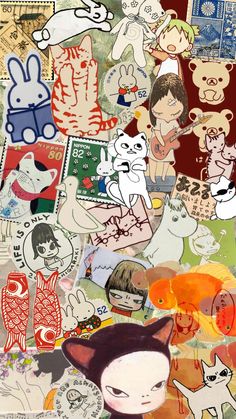 a collage of cats, dogs and other stickers on a piece of paper