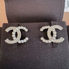 Chanel Cc Pearl Crystal Earrings From 24s Collection. Purchased From Chanel Boutique Recently. Perfect Condition! Comes With: Original Box Original Jewelry Pouch Luxury Sparkling Earrings For Anniversary, Designer Jewelry Set With Earrings, Designer Sterling Silver Earrings, Designer White Gold Earrings, Luxury Silver Earrings, Luxury Bling Earrings For Formal Occasions, Luxury Sparkling Silver Earrings, Designer Round Silver Earrings, Designer Silver Round Earrings