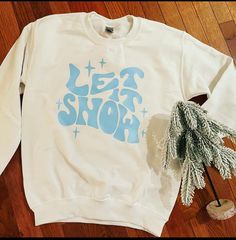 Let It Snow Groovy, Retro Sweatshirt or Shirt  Please follow washing instructions that come with your purchase  Wash inside out, cold  Hang to dry  Mumsy Designs is not responsible for your purchase once it has shipped. Retro Sweatshirts, Groovy Retro, Winter Sweatshirt, Let It Snow, Washing Instructions, Sweat Shirt, Favorite Outfit, Inside Out, Gender Neutral