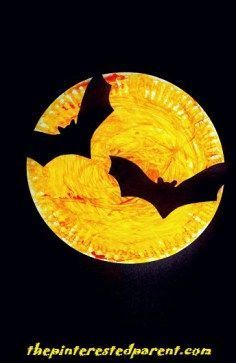 a paper plate with two bats on it