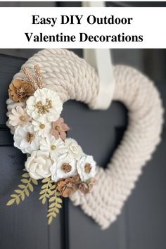 an easy diy outdoor valentine's day decoration made with yarn and flowers is perfect for the front door