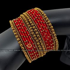 Design by Classical Dance Jewelry® ❥ Product Details: Designer and trendy stones studded bangles set from the Classical Dance Jewelry is perfect for all occasions. ❥ Our graceful designs compliments with your ethnic, western and Indo-Western outfits. ❥ These Stone bangles totally give you a very good option for Bharatnatyam, Kuchipudi, Seemantham, Wedding, pellikuthuru, Diwali, Navaratri, Pongal, Ganesh Chaturdi, Baby shower Decor. ❥ choodi | churi | Valail | Stone gaajulu are good return gifts Bangle Jewelry For Navratri Celebration, Festive Bangle With Stone Work For Celebration, Red Festive Bracelets For Navratri, Adjustable Zari Work Jewelry For Wedding, Adjustable Zari Work Wedding Jewelry, Temple Jewelry Bangle For Celebration, Adjustable Wedding Jewelry With Zari Work, Festive Celebration Bangle With Stone Work, Red Bracelets For Navratri Celebration