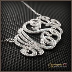 "Our Cutoff Date for Christmas delivery is Sunday Dec. 13, 2020 All Order placed after this date will be completed for mid January delivery. Personalized gold and diamond monogram necklace 1.0\" inch high, 1.5\" wide and about 1mm thick, made of solid 14kt. white gold and has a total of 0.80ct. in diamonds. The necklace suspends from a cable Link chain with 3 choices of length: 14\",16\" and 18\". The Monogram can be made with the initials of your choice. Please use the note section available at Personalized Sterling Silver Diamond Necklace For Formal Occasions, Elegant Necklaces With Initials For Anniversary, Classic Diamond-accent Name Necklace For Anniversary, Classic Name Necklace With Diamond Accents For Anniversary, Anniversary Jewelry With Initial Pendant Hallmarks, Luxury Initials Jewelry In Cubic Zirconia, Silver Diamond Round Name Necklace, Luxury Silver Round Name Necklace, Personalized White Gold Diamond Necklace For Formal Events