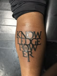 a person with a tattoo on their leg