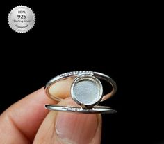 "Product Details :-  Ring Thick Bezel Setting Cup For Round Gemstone Back Side :- Select From Personalization, (If buyer did not select the back side from personalization, then we will make it CLOSE by default) (If buyer did not select the plating from personalization, then we will make it \"925 STERLING SILVER POLISH\" by default) Shape - Round Material :- Only Pure 925 Sterling Silver Shipping :-  . * Delivery by normal courier will take 15-25 days  * If any buyer need items more fast, Then me Minimalist Silver Crystal Ring With Bezel Setting, Silver Crystal Ring With Bezel Setting, Adjustable Round Crystal Ring With Bezel Setting, Adjustable Sterling Silver Crystal Ring With Bezel Setting, Silver Rings With Bezel Setting, Silver Crystal Ring With Bezel Setting For Anniversary, Silver Stackable Rings With Stone Setting, Silver Stackable Crystal Ring, Adjustable Stackable Rings With Stone Setting