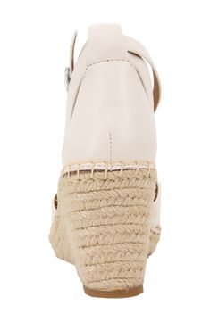 An earthy espadrille-style wedge keeps your look warm-weather ready in a stylish leather sandal complete with a well-cushioned footbed for endless comfort. 3" heel Multilayered, PORON®-cushioned footbed Leather upper and lining/rubber sole Imported Natural Wedge Sandals With Woven Sole And Round Toe, Vacation Wedge Sandals With Leather Footbed, Cream Leather Wedge Sandals With Cushioned Footbed, Cream Leather Wedge Sandals For Beach, Beige Wedge Heel Espadrilles With Cushioned Footbed, Beige Espadrilles With Cushioned Footbed And Wedge Heel, Casual Wedge Sandals With Leather Footbed, Casual Leather Footbed Wedge Sandals, Natural Leather Wedge Sandals With Cushioned Footbed