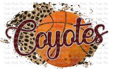 a basketball with the word cyclones on it and an orange ball in leopard print