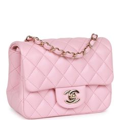 This Mini Square flap bag is of pink lambskin leather with light gold hardware and has a front flap with signature CC turnlock closure, rear half moon pocket, single interwoven pink leather and light gold tone chain link shoulder/crossbody strap. The interior is lined in pink leather and features a zipper pocket with Chanel pull and an open pocket below. Collection: 21S (RFID Chip) Origin: Italy Condition: Pristine; new or never worn Accompanied by: Chanel box, Chanel dustbag, ribbon, carebook, felt Measurements: 6.5" width x 5" height x 3" depth; 22.5" strap drop Chanel Rose, Chanel Mini Rectangular, Chanel Box, Classic Flap Bag, Chanel Mini, Gold Chanel, Pink Chanel, Madison Avenue, Bag Light