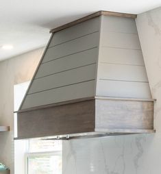 a stove top oven sitting inside of a kitchen