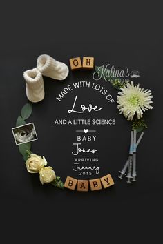 a baby announcement with flowers and shoes