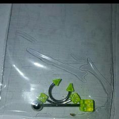 a pair of scissors sitting on top of a plastic bag