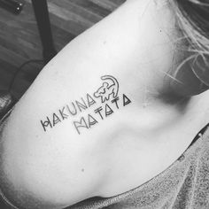 a woman with a tattoo on her shoulder that reads makuna matata 4