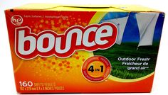 a box of bounce outdoor fresh air laundry deterant on a white background with grass and blue sky in the background