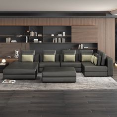 a modern living room with grey leather furniture