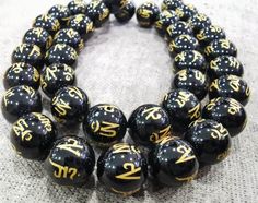 material:natural stone quantity:one strand 16inch=48-28pcs size:approx.8-14mm note:have larger stock and offert wholesale price. Buddhist Mantra, Om Mani Padme Hum, Sacred Symbols, Agate Gemstone, Bead Strand, Gold Beads, Mantra, Natural Stones, Agate