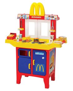 a child's play kitchen with a mcdonalds theme