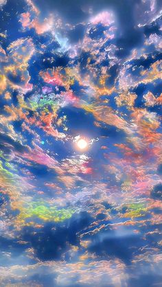 the sky is filled with colorful clouds and bright colors