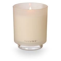 a white candle with the word i lume on it in front of a white background