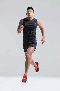 a man is running on a white background