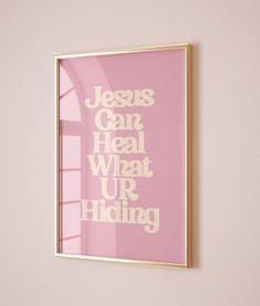 a pink and gold framed poster with the words jesus can heal what up hiding in it