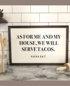 a framed print with the words as for me and my house, we will serve tacos