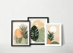 three framed art prints with palm leaves and sunset in the background, hanging on a wall