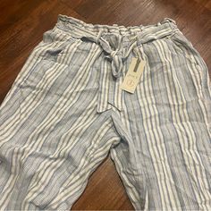 Never Worn New With Tags Has A Tie At Waist Blue Bottoms With Tie Waist For Day Out, Blue Bottoms With Tie Waist For Spring, Blue Tie Waist Bottoms For Spring, Striped Pants For Beach In Spring, Blue Paperbag Waist Bottoms For Spring, Casual Blue Bottoms With Tie Waist, Blue Tie-waist Bottoms For Day Out, Striped Tie Waist Bottoms For Summer, Striped Bottoms With Tie Waist For Spring