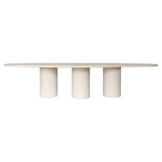 a white table with three columns on it