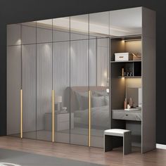 a bedroom with mirrored closet doors and a white bench in front of the mirror wall