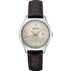 Dress up any casual or business attire with this sophisticated women's watch from Seiko's Essential collection. Dress up any casual or business attire with this sophisticated women's watch from Seiko's Essential collection. DISPLAY Sunray dial Day & date window Luminescence: hands & hour markers Face cover material: Hardlex crystalCASE Material: stainless steel Waterproof screw-down caseback & crown Diameter: 30 mmBAND Band type: brown leather strap Clasp: buckle Circumference: 140 m Timepiece Design, Brown Leather Strap Watch, Leather Strap Watch, Seiko Watches, Brown Leather Strap, Women Essentials, Women's Watch, Classic Dress, Business Attire