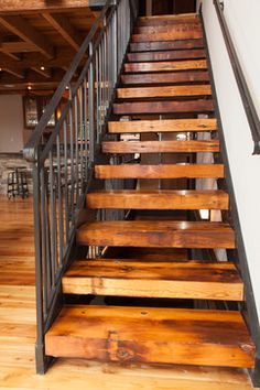 the stairs are made out of wood and metal