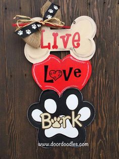 mickey mouse door hanger with live love bark and dog paws on it's side