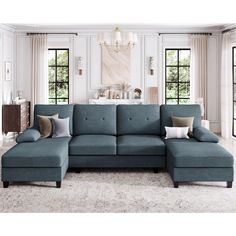 a living room with a blue sectional couch