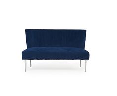 an upholstered blue couch with metal legs