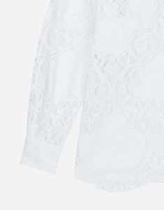 Cotton poplin shirt with floral openwork embroidery: White Shirt collar Long sleeves Regular fit Button fastenings The piece measures 68 cm from the center back on a size IT 40 The model is 175 cm tall and wears a size IT 40 Made in Italy Elegant Formal Blouse With Chikankari Embroidery, Designer Embroidered White Blouse, Designer White Embroidered Blouse, Elegant Long Sleeve Cutwork Top, Elegant White Shirt With Floral Embroidery, Fitted Summer Blouse With Cutwork, Elegant Summer Blouse With Cutwork, Elegant Summer Cutwork Blouse, Elegant Long Sleeve Blouse With Cutwork