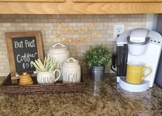 a coffee maker sitting on top of a kitchen counter