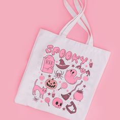 Elevate your Halloween spirit with our Retro Pink Halloween Canvas Tote Bag! Perfectly combining utility and style, this bag showcases a charming vintage-inspired characters. Designed to spark nostalgia and laughter, it's a must-have accessory for your Halloween celebrations. It offers ample space for your treats, small errands, or daily essentials. Its dual handles provide easy carry comfort, while the bag's dimensions make it a great companion for trick or treating, festive gatherings, or just to add a bit of whimsical charm to your everyday outfits during the spooky season. Experience Halloween with a retro twist this year. Our Retro Halloween Character Canvas Tote Bag promises to add a dash of fun and style to your autumnal adventures! DETAILS: ♥ 15" x 16"- perfect for everyday wear ♥ Decorated Tote Bags, Diy Tote, Halloween Candy Bags, Halloween Tote Bag, Halloween Tote, Halloween Bags, Diy Tote Bag, Trick Or Treat Bags, Halloween Aesthetic