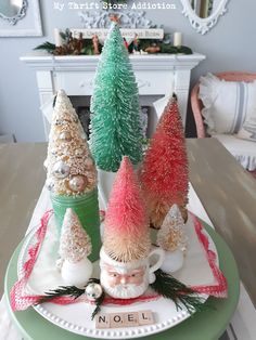 a plate with christmas trees on it sitting on a table