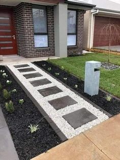 a house with landscaping in the front yard