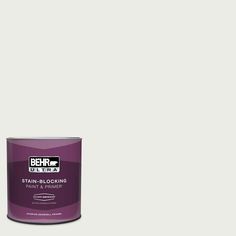 a can of behr ultra stain - blocking paint on a white background with the words,