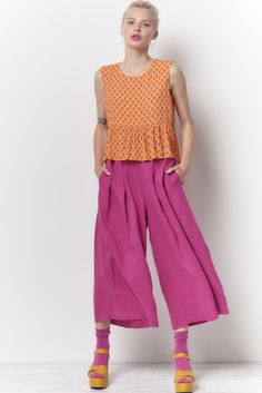 The Trudy pant is high waisted cropped pant. There are 2 button tabs on the front waist and stitched elastic on the back waist. Shown here in our Dyed Linen. Content: 100% Linen Color: Fuchsia Fits: Fitted waist with a full leg Sizes: XS-L What we Love: Great styling and fit Made In Los Angeles with Love Model is 5'9" size 2 and is wearing a size S *Mask sold separately Measurements are taken relaxed, take your normal size Cropped Wide Leg Pants With Pockets, Casual Fitted Cropped Wide Leg Pants, Cropped Cotton Bottoms With Belt Loops, Cropped Pants With Pockets For Spring, Cropped Linen Workwear Bottoms, Spring Cropped Pants With Relaxed Fit, Summer Cropped Bottoms With Pockets, Spring Cropped Bottoms With Elastic Waistband, Cropped Summer Bottoms With Pockets