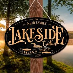 Lake house decor sign on a metal oval black textured sign with the words Lakeside Cabin relax and enjoy.. Lakehouse Sign, Lakeside Retreat, Lake Cabin Decor, Bait Shop, Lake House Sign, Lake House Signs, Patio Signs, Lakeside Cabin, Lakeside Living