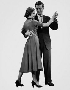 an old black and white photo of a man and woman dancing the charleston swing dance