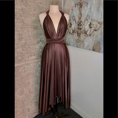 High/Low Signature Wrap Dress Brown A-line Midi Dress For Evening, Brown A-line Midi Dress For Party, Brown Evening Dress, Midi Length, Brown Draped Evening Dress, Brown Silk Cocktail Dress, Elegant Draped Brown Dress, Elegant Brown Draped Dresses, Brown V-neck Cocktail Dress, Chic Brown Draped Dress